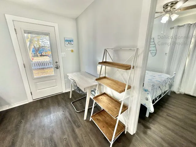 a bed room with a bed and a window