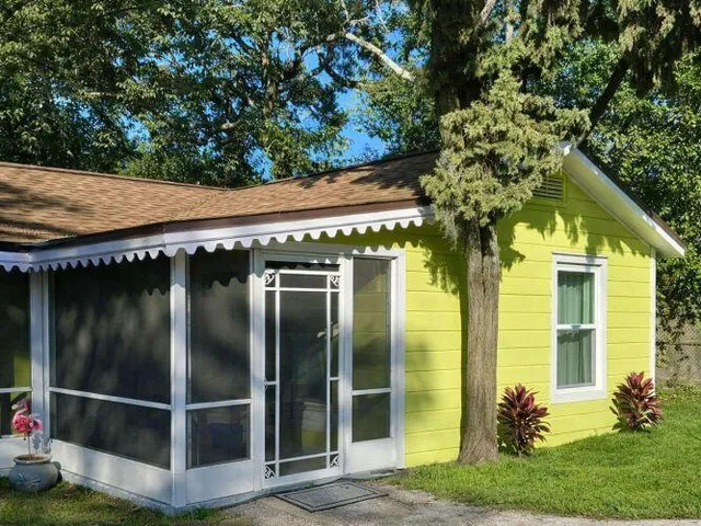 a view of swimming pool with a yard