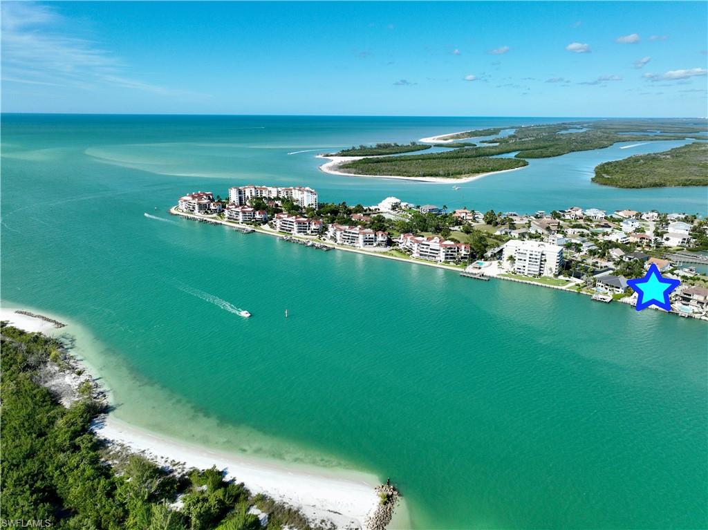 a view of a lake with a big yard