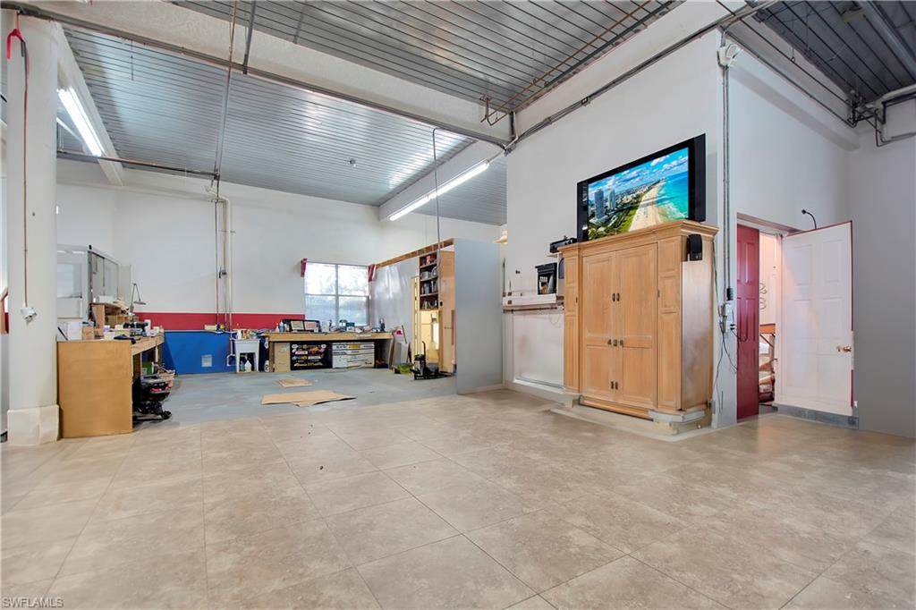 28 West Pelican Street Naples, FL 34113 - Photo 32 of 50 a view of a storage & utility room