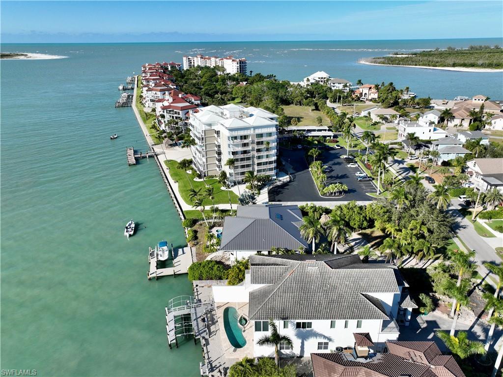28 West Pelican Street Naples, FL 34113 - Photo 45 of 50 an aerial view of a house with outdoor space