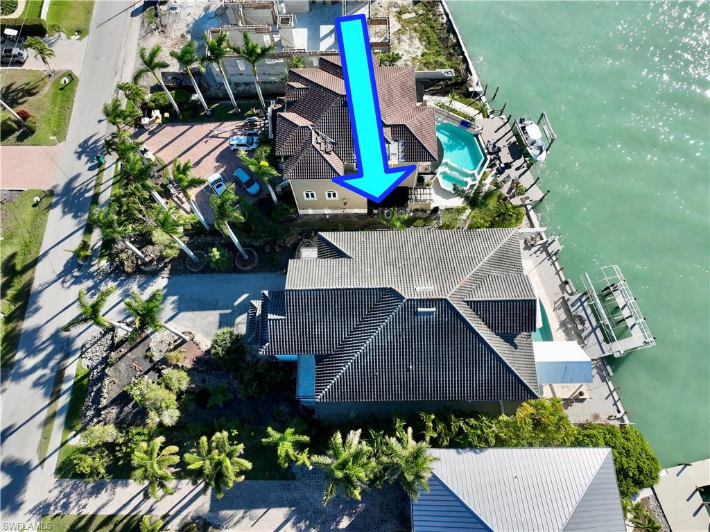 28 West Pelican Street Naples, FL 34113 - Photo 46 of 50 an aerial view of a house