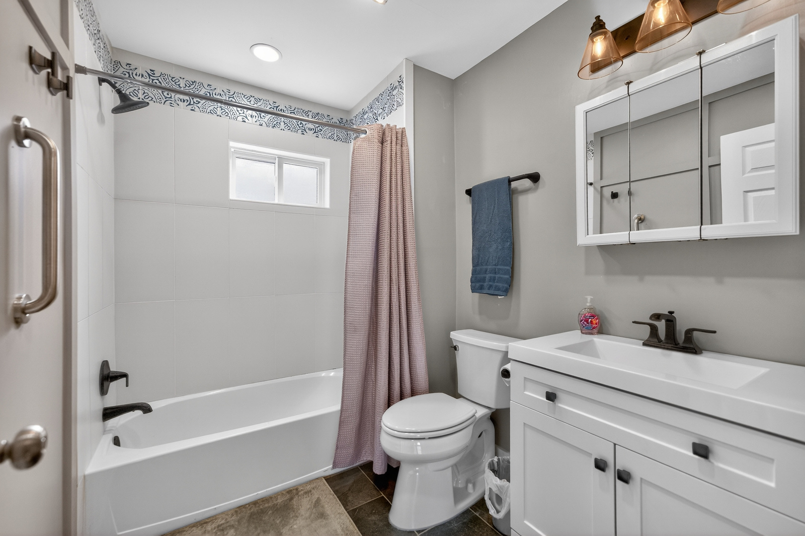 720 East Harrison Avenue Wheaton, IL 60187 - Photo 11 of 28 a bathroom with a sink toilet and shower