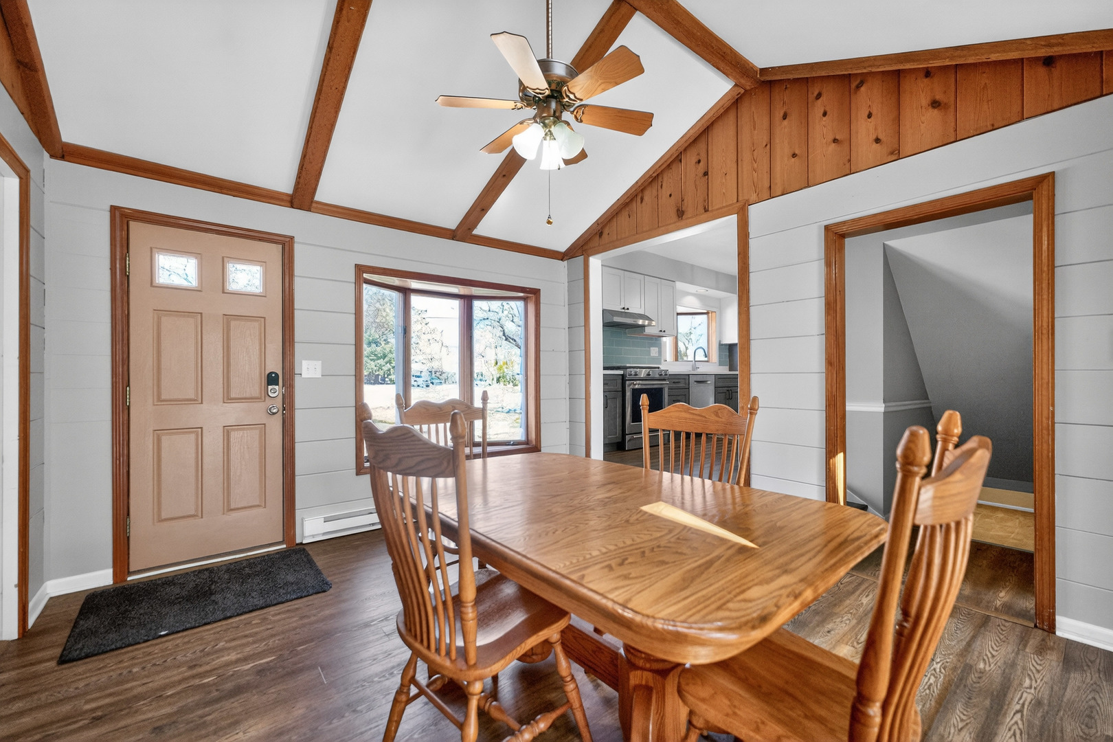 720 East Harrison Avenue Wheaton, IL 60187 - Photo 15 of 28 a view of a dining room with furniture window and wooden floor