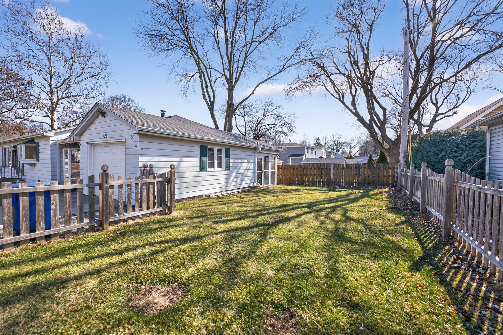 720 East Harrison Avenue Wheaton, IL 60187 - Photo 27 of 28 a view of a house with swimming pool and deck