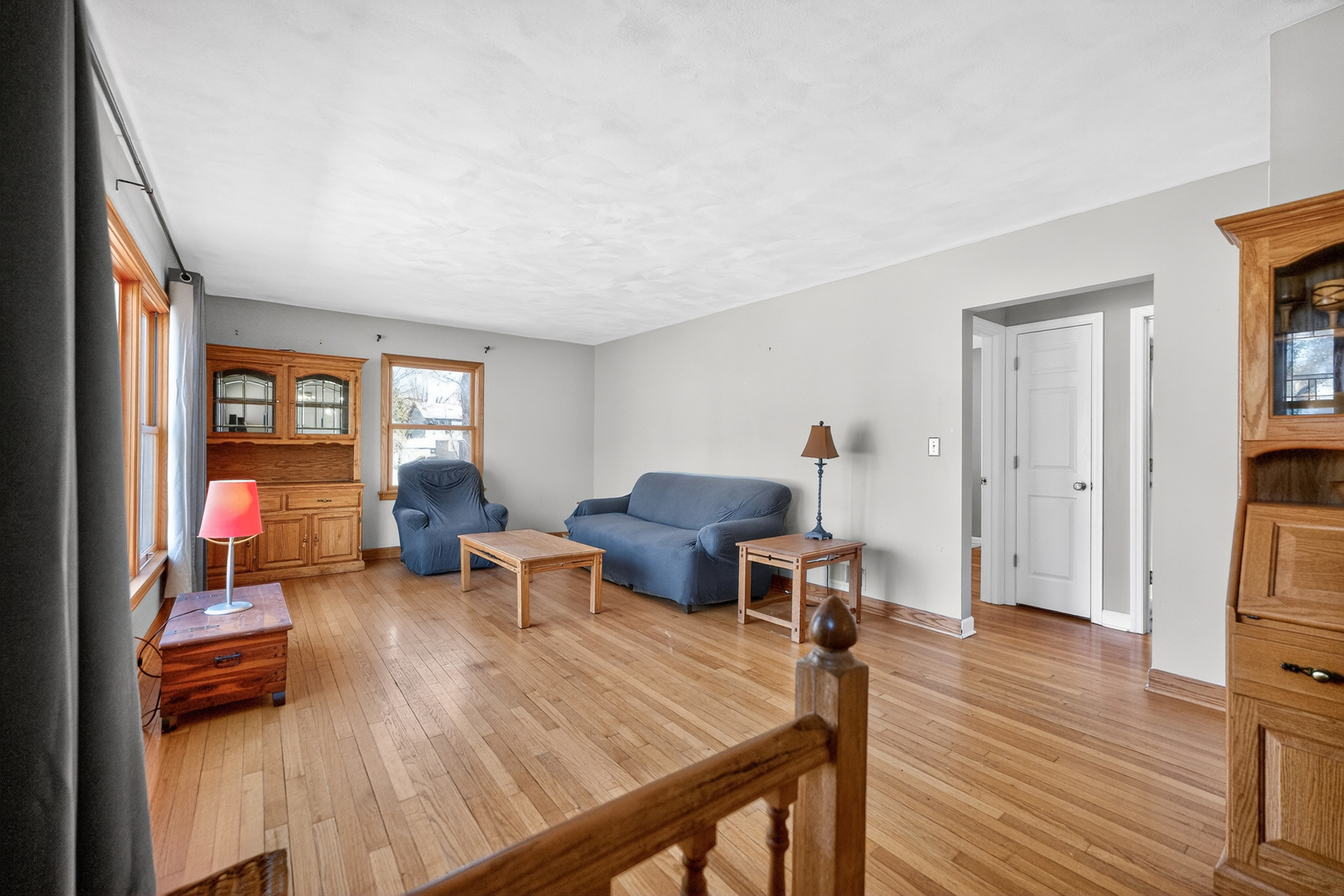 720 East Harrison Avenue Wheaton, IL 60187 - Photo 3 of 28 a living room with furniture and a wooden floor