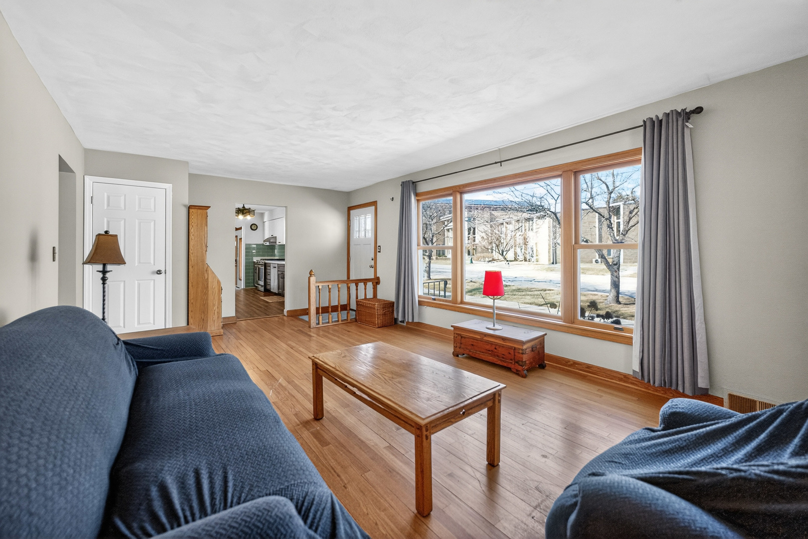 720 East Harrison Avenue Wheaton, IL 60187 - Photo 5 of 28 a living room with furniture and a flat screen tv