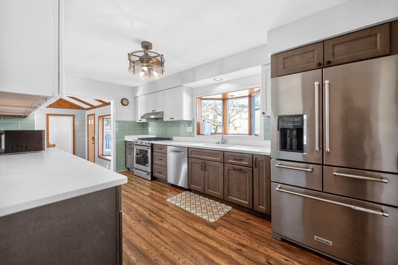 720 East Harrison Avenue Wheaton, IL 60187 - Photo 6 of 28 a kitchen with stainless steel appliances a refrigerator sink and cabinets
