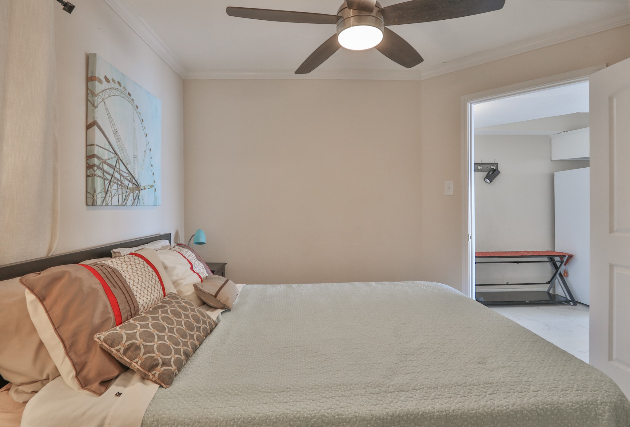 11949 Termini-San Luis Pass Road, Unit 304 Galveston, TX 77554 - Photo 20 of 39 The bedroom offers storage below the bed