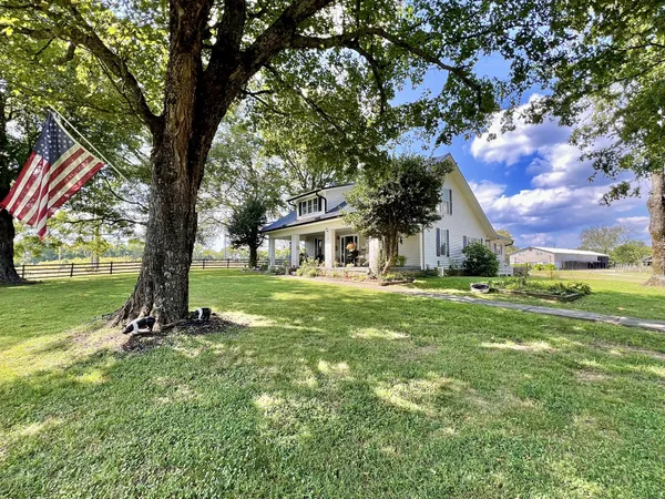 a house with yard in front of it