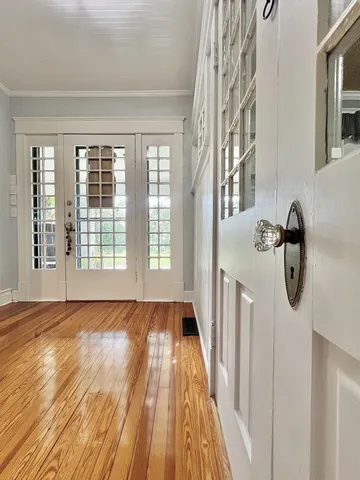 a kitchen with a sink appliances and a window