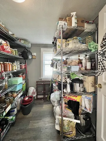 a bathroom with a toilet a sink and a shower