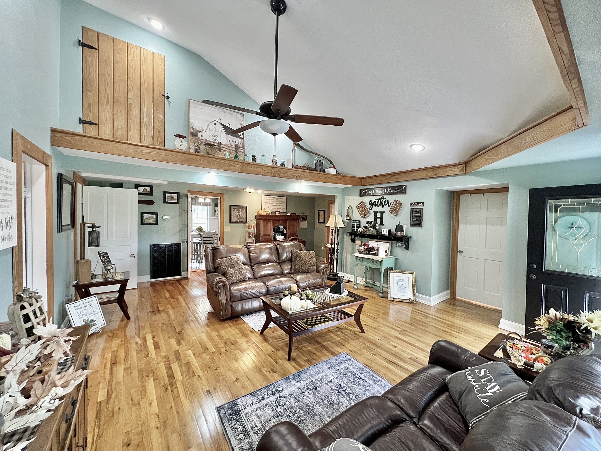 1400 Ragsdale Lane Pulaski, TN 38478 - Photo 32 of 100 a living room with furniture kitchen view and a chandelier