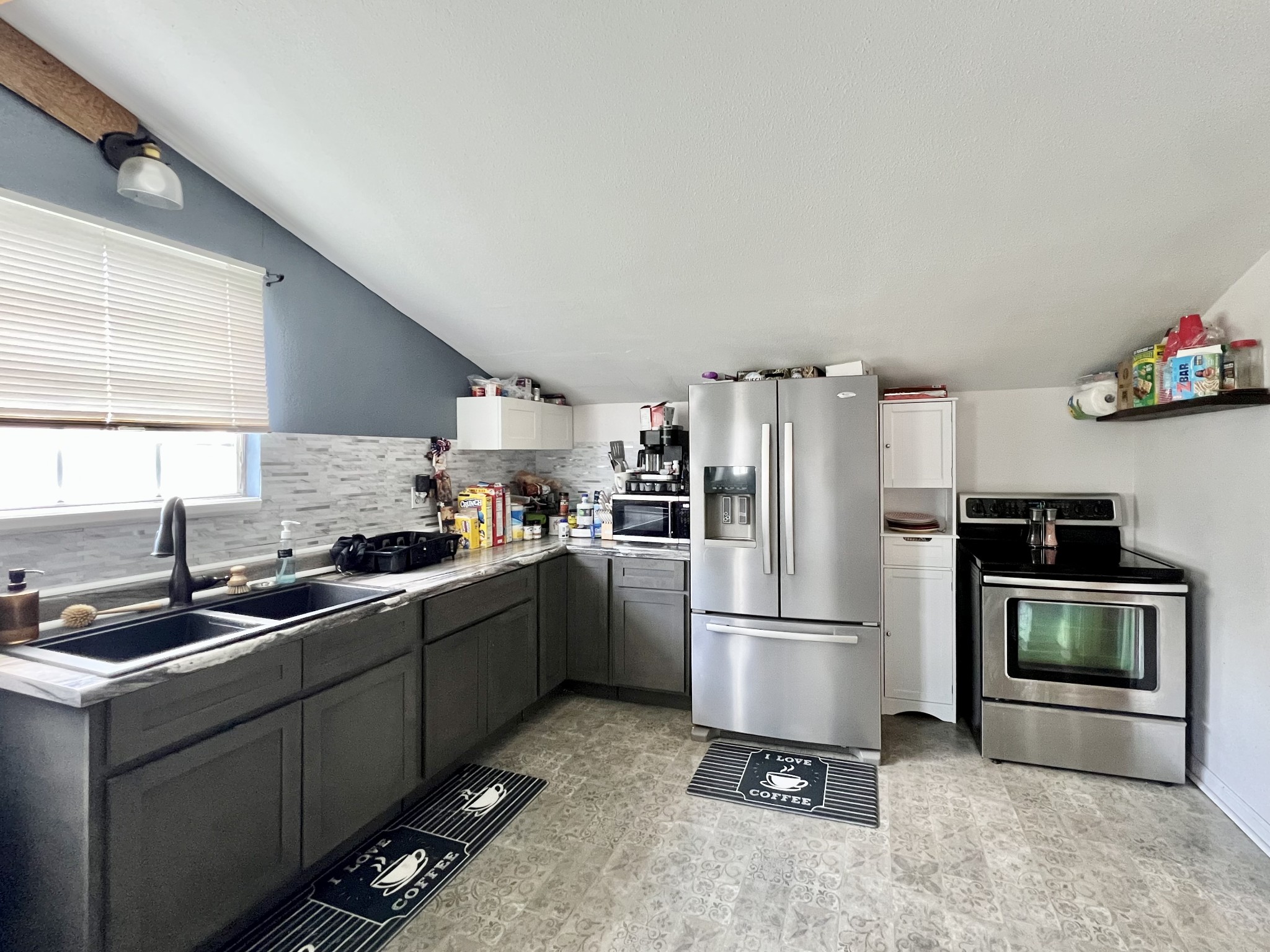 1400 Ragsdale Lane Pulaski, TN 38478 - Photo 73 of 100 a kitchen with a sink stainless steel appliances and cabinets