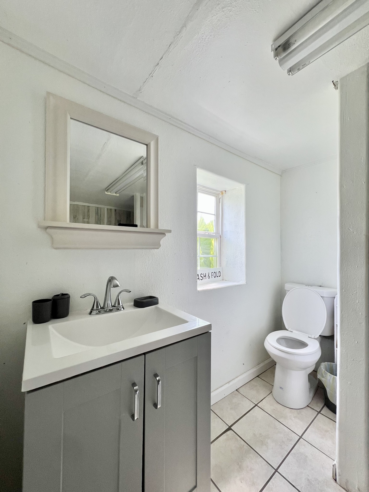 1400 Ragsdale Lane Pulaski, TN 38478 - Photo 78 of 100 a bathroom with a sink toilet and a mirror