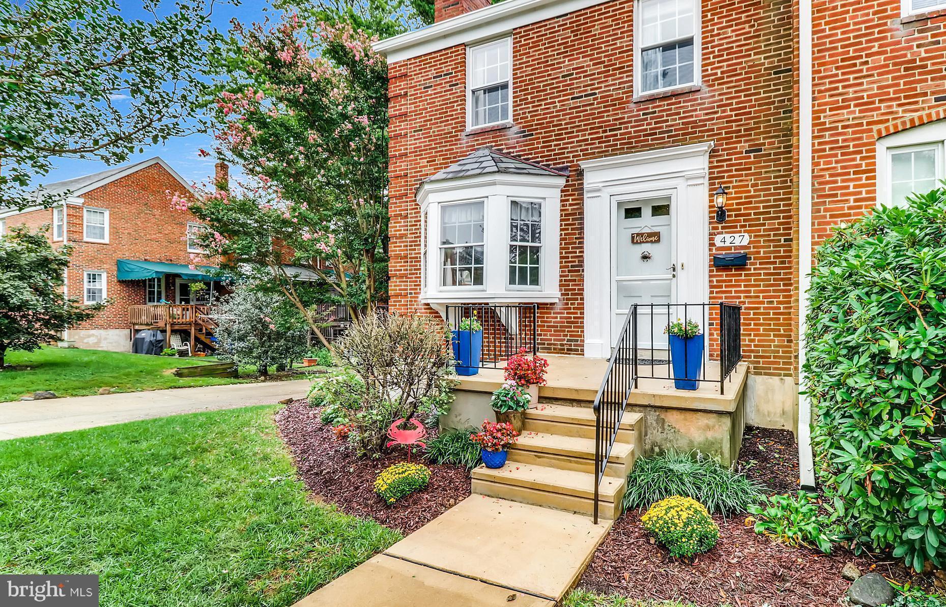 427 Stratford Road Baltimore, MD 21228 - Photo 1 of 29 a front view of a house with a yard