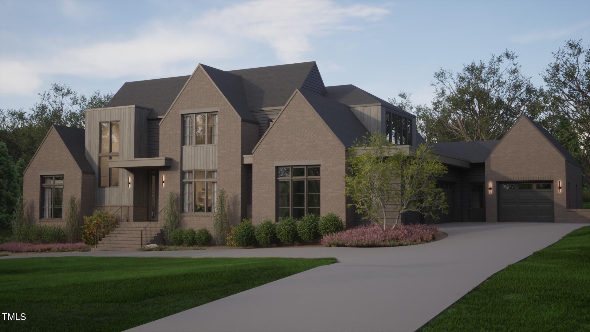 4905 Foxridge Drive Raleigh, NC 27614 - Photo 2 of 5 a front view of a house with a garden