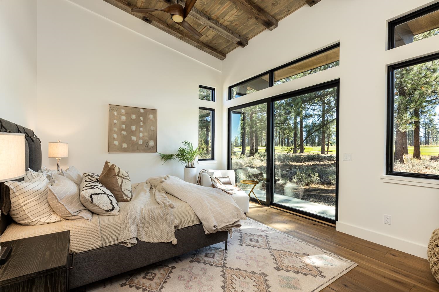 11654 Henness Road Truckee, CA 96161 - Photo 14 of 21 a bedroom with bed and wooden floor