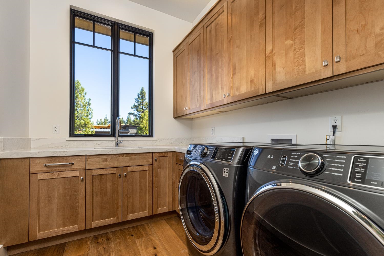11654 Henness Road Truckee, CA 96161 - Photo 17 of 21 a utility room with sink dryer and washer