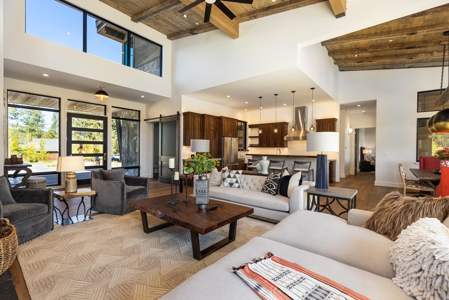 11654 Henness Road Truckee, CA 96161 - Photo 4 of 21 a living room with furniture kitchen view and a large window