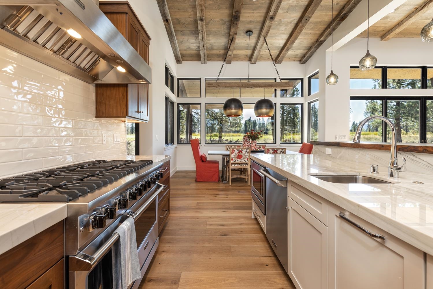 11654 Henness Road Truckee, CA 96161 - Photo 7 of 21 a kitchen with stainless steel appliances a sink stove and cabinets