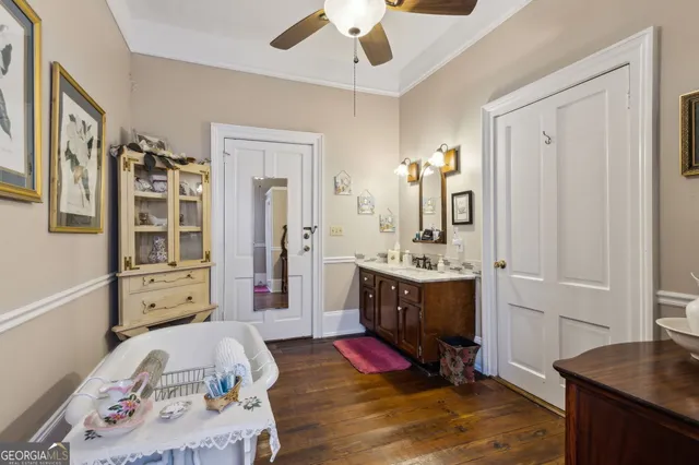 a view of an entryway with wooden floor