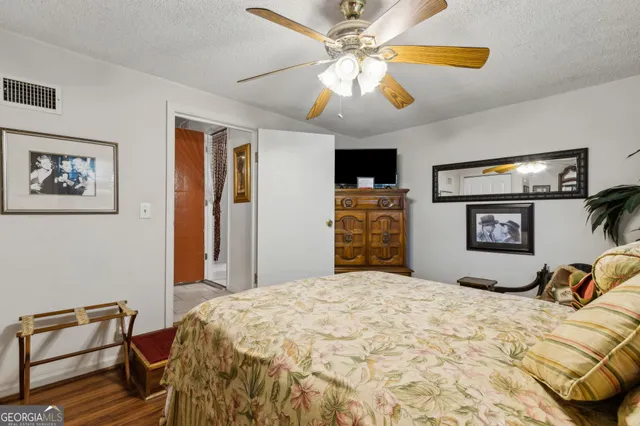 a dining room with furniture garden view and a chandelier
