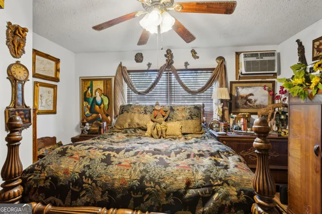 an aerial view of residential houses with outdoor space and ocean view