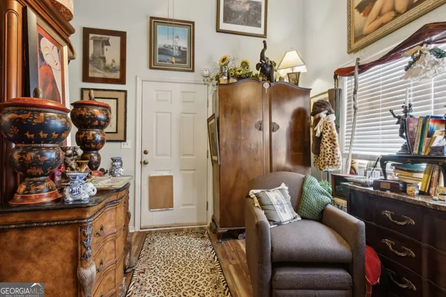 an aerial view of residential houses with outdoor space and river