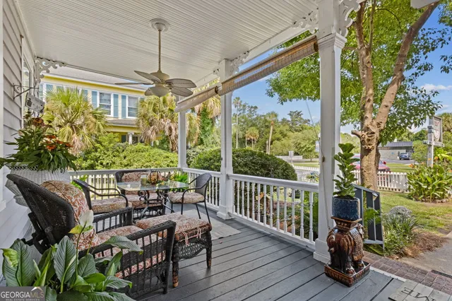 a outdoor living space with furniture and a potted plant