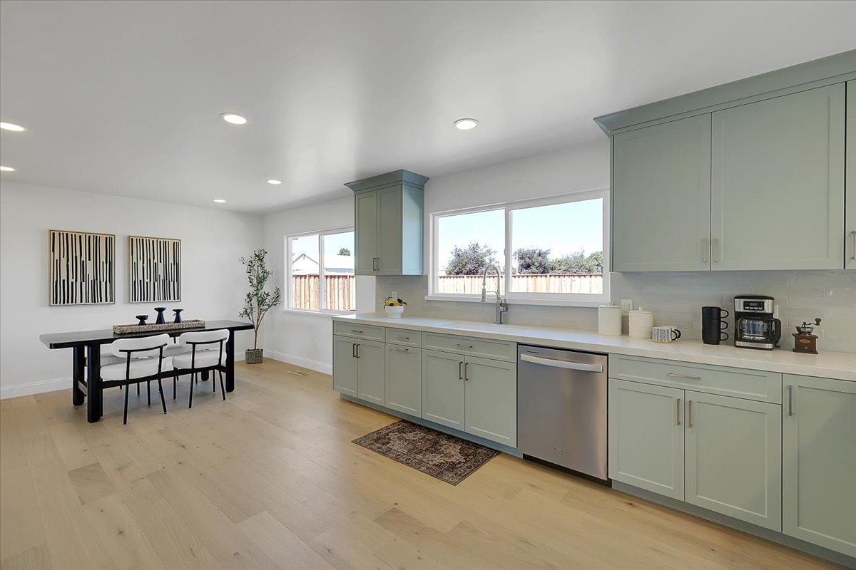 1181 Barry Road Yuba City, CA 95991 - Photo 18 of 60 a kitchen with sink table and chairs