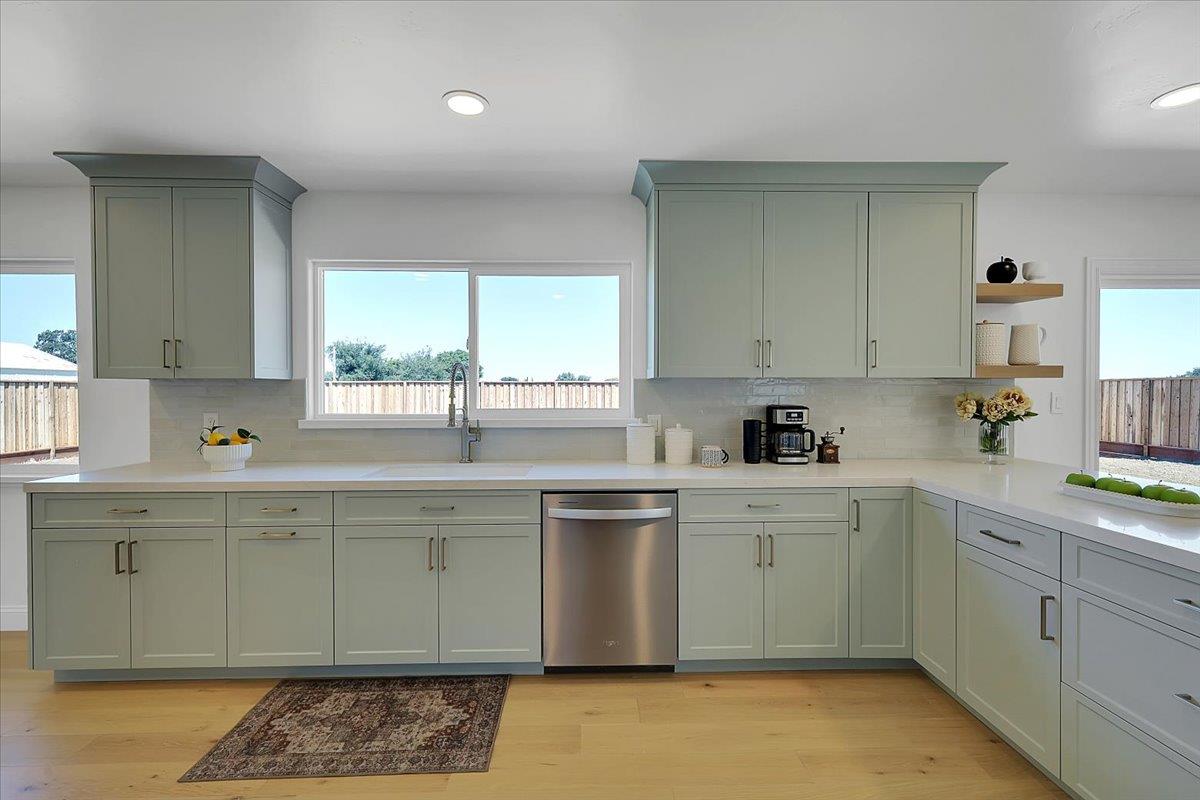 1181 Barry Road Yuba City, CA 95991 - Photo 20 of 60 a kitchen with a sink cabinets and window