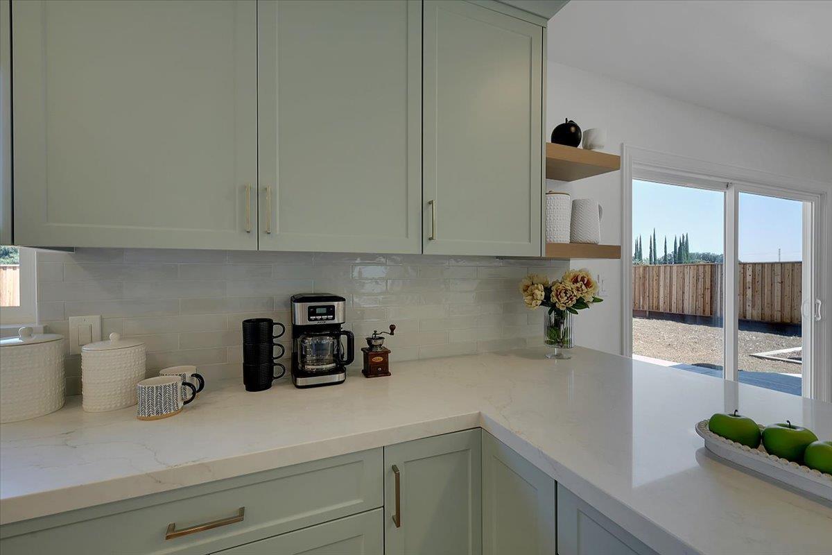 1181 Barry Road Yuba City, CA 95991 - Photo 21 of 60 a kitchen with a sink and cabinets