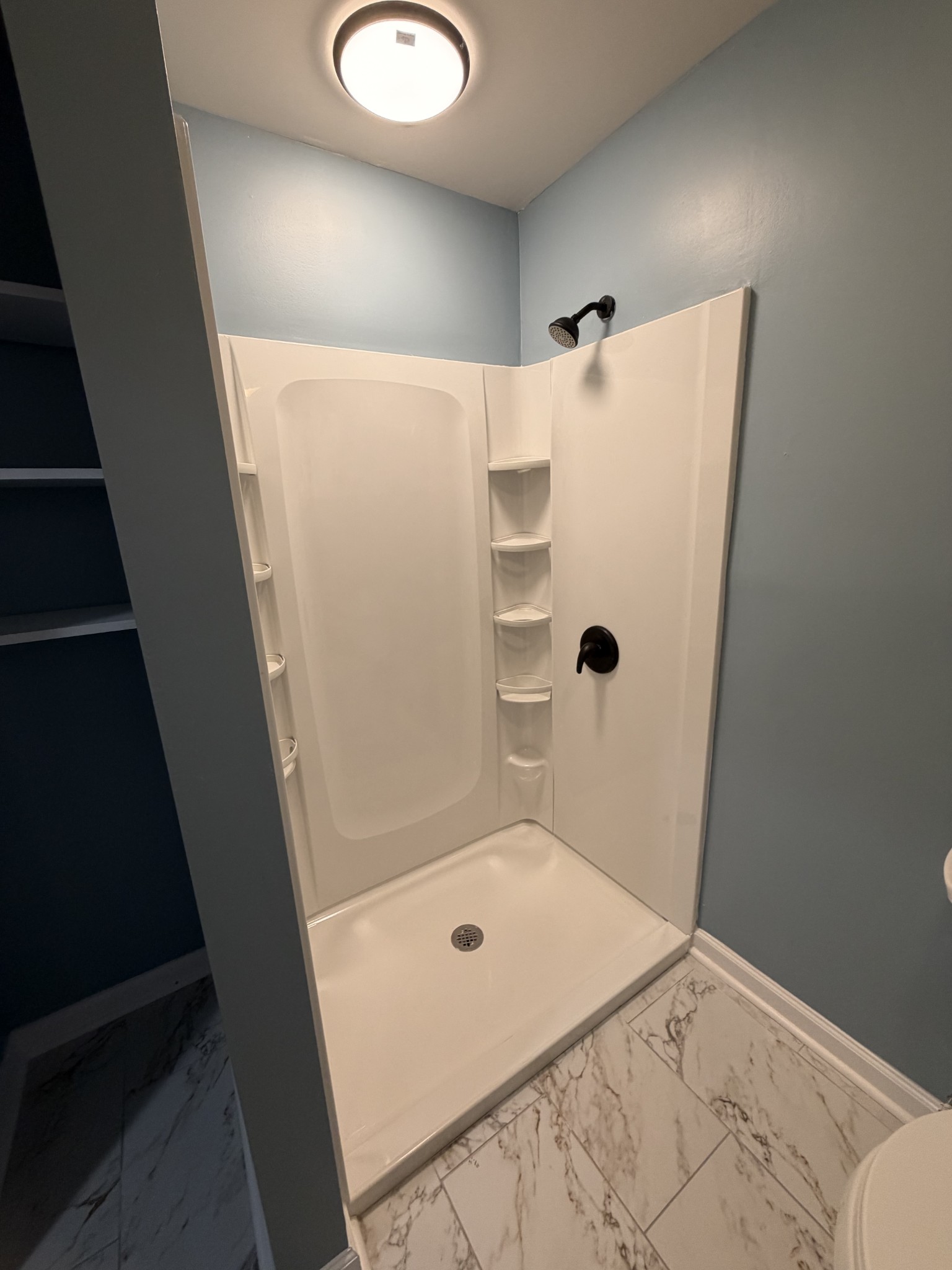 4973 Awalt Road Tullahoma, TN 37388 - Photo 12 of 40 a bathroom with a bathtub