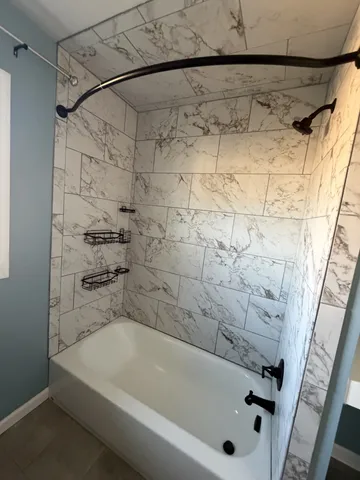 a bathroom with a bathtub
