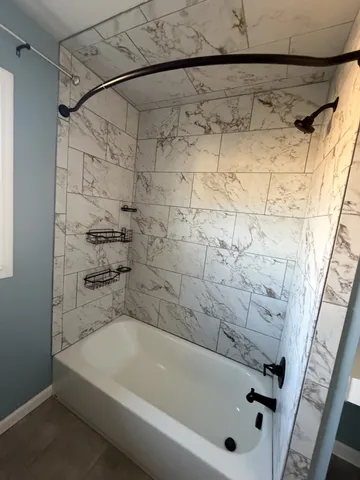 a bathroom with a bathtub