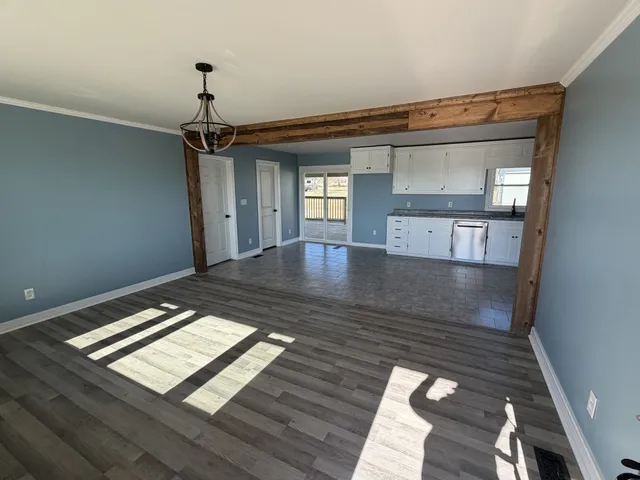 a view of an empty room and window