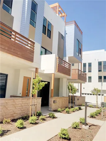 a street corner with a building in the background