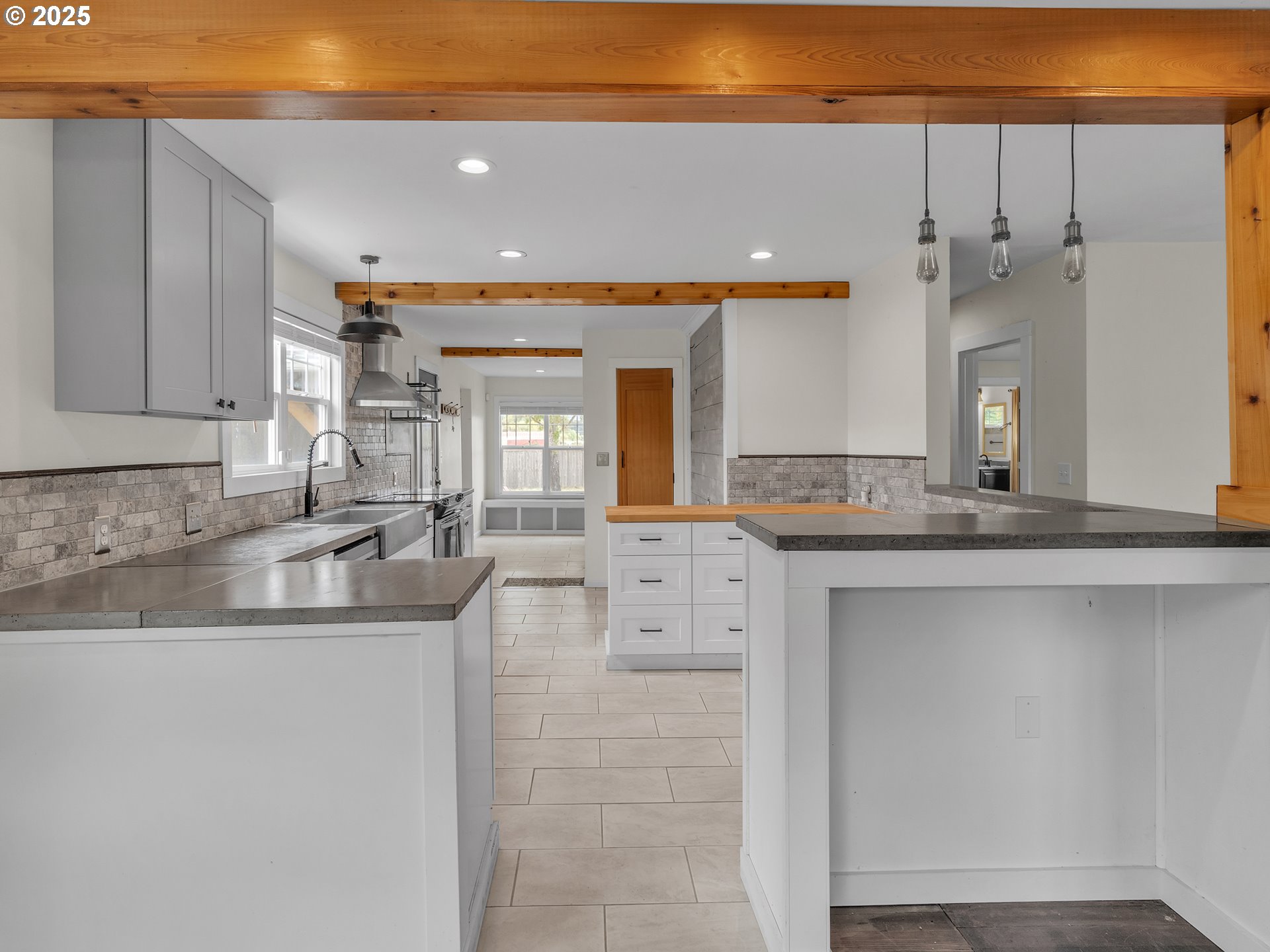 38280 Southwest Fort Hill Road Willamina, OR 97396 - Photo 17 of 31 a kitchen with stainless steel appliances granite countertop a sink and a refrigerator