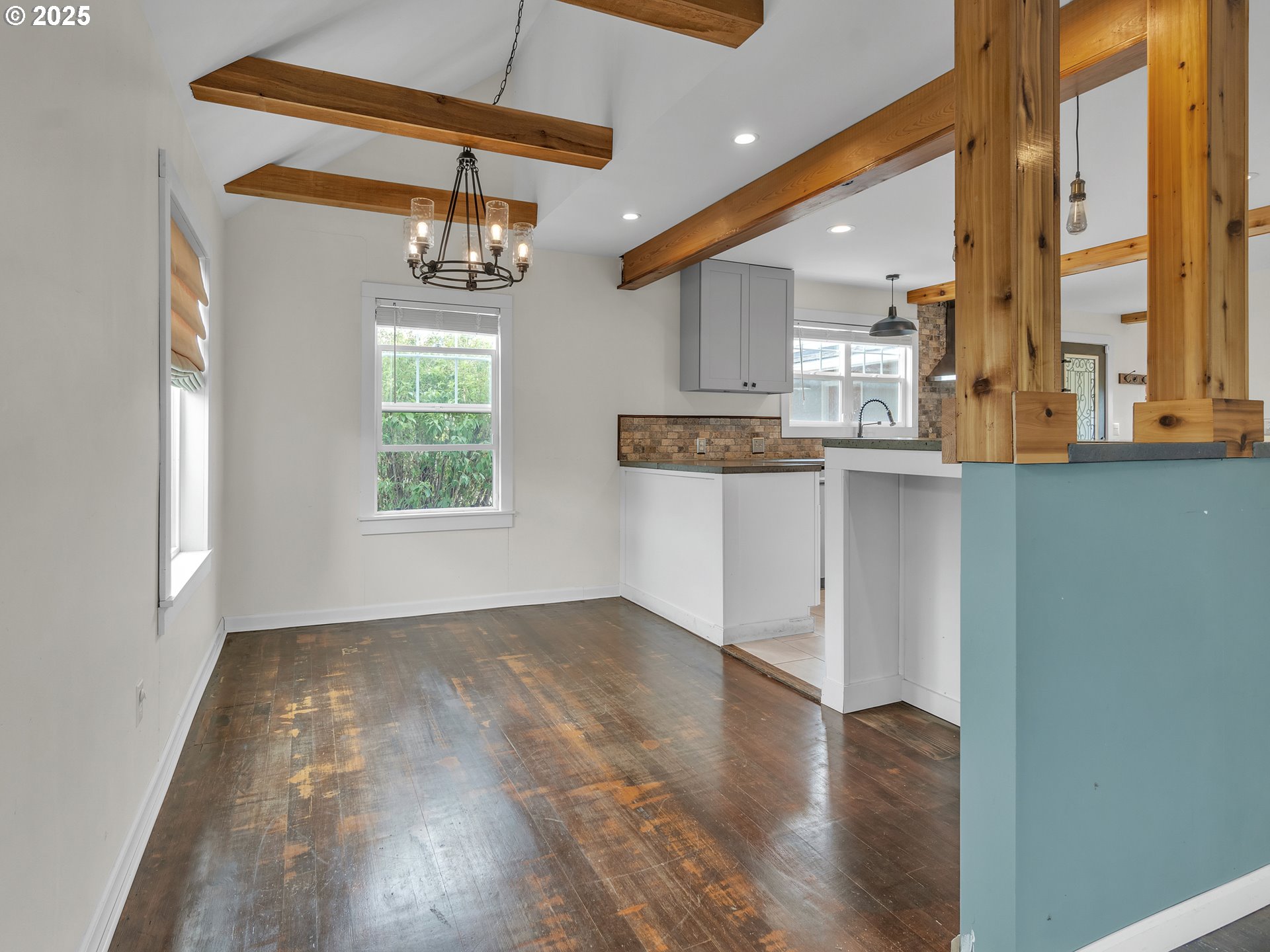 38280 Southwest Fort Hill Road Willamina, OR 97396 - Photo 20 of 31 an empty room with wooden floor and windows