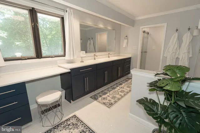 a room with furniture a window and a table