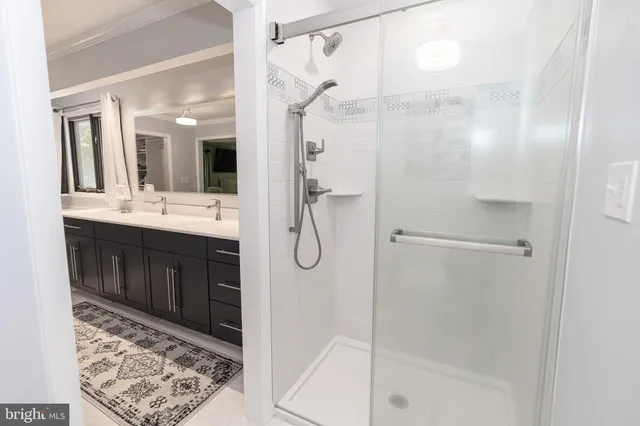 a bedroom with a bed and a table in it