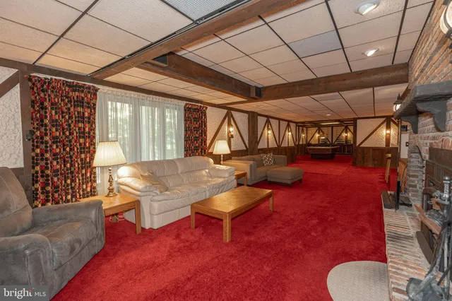 a view of a backyard with sitting area