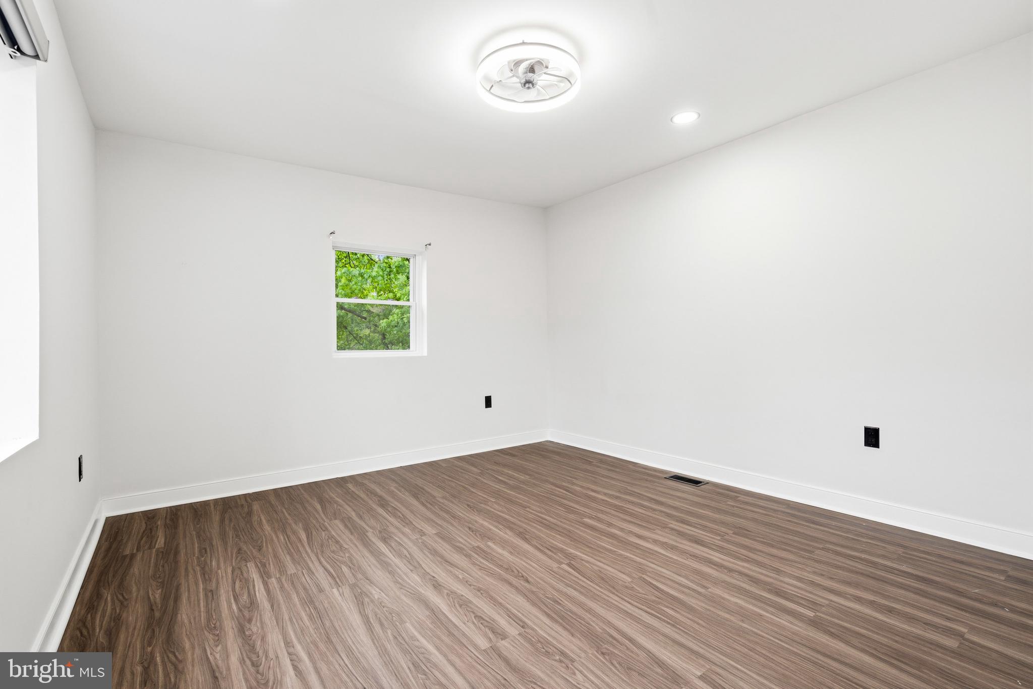 9529 Temple Hill Road Clinton, MD 20735 - Photo 8 of 14 a view of room with window and wooden floor