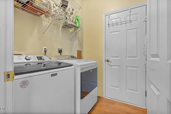 a utility room with washer and dryer