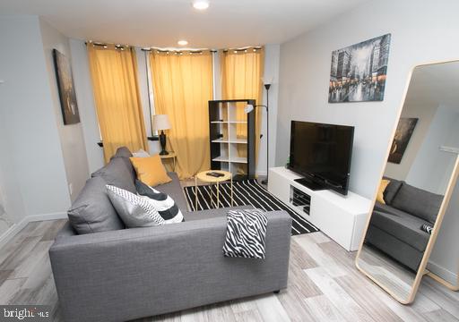 2135 Walnut Street, Unit 304 Philadelphia, PA 19103 - Photo 2 of 8 Modern living space with vibrant hues.