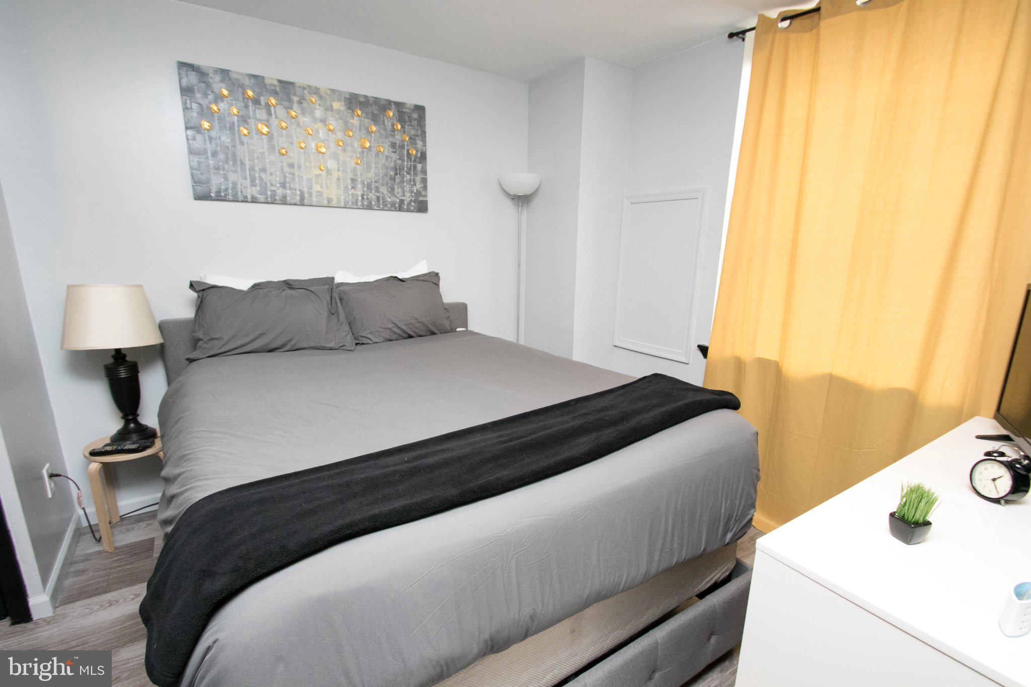 2135 Walnut Street, Unit 304 Philadelphia, PA 19103 - Photo 4 of 8 Cozy retreat with warm accents.