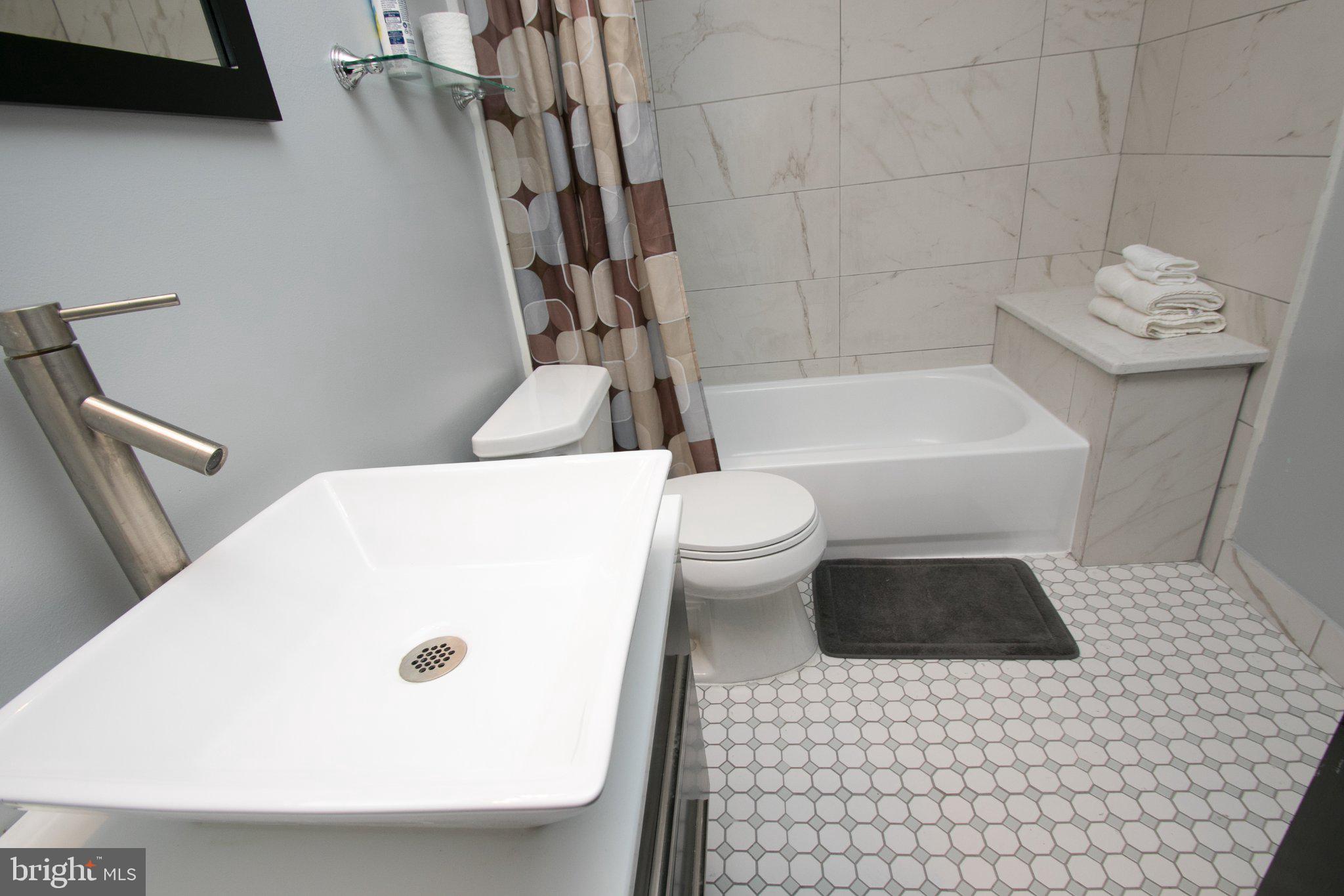 2135 Walnut Street, Unit 304 Philadelphia, PA 19103 - Photo 6 of 8 Modern bathroom with sleek design.