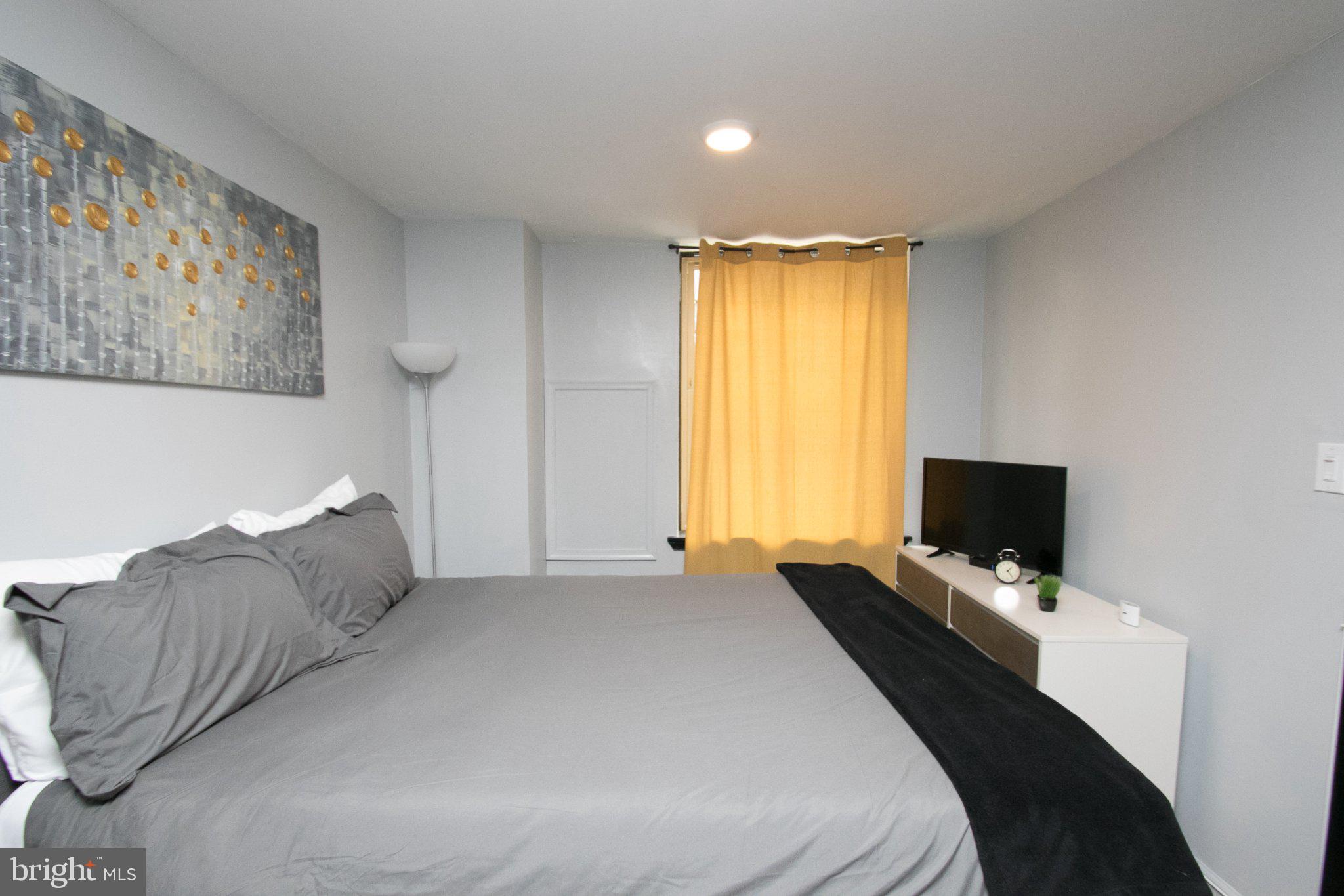 2135 Walnut Street, Unit 304 Philadelphia, PA 19103 - Photo 8 of 8 Cozy retreat with warm accents.