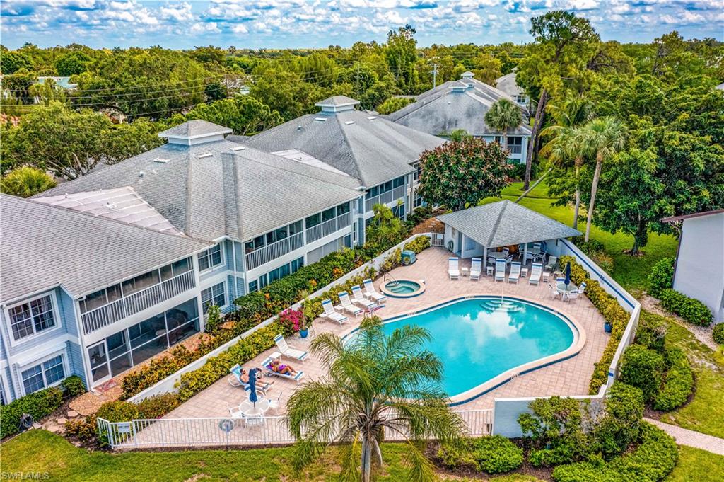 1350 Misty Pines Circle, Unit 204 Naples, FL 34105 - Photo 17 of 19 an aerial view of a house